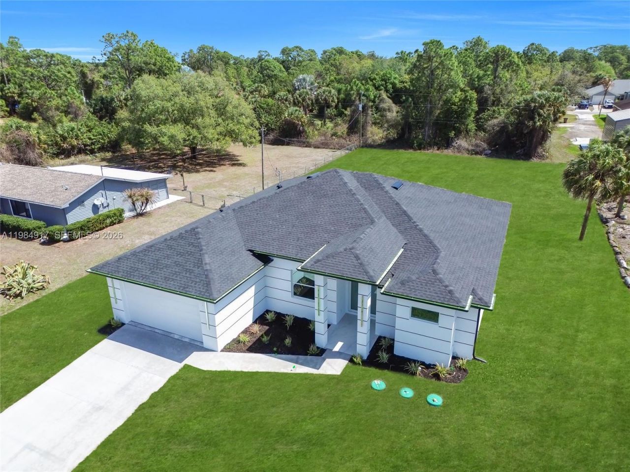 704 Clayton, Lehigh Acres, FL 33972 Photo