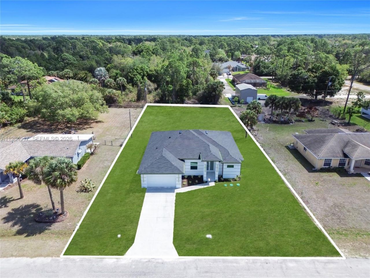 704 Clayton, Lehigh Acres, FL 33972 Photo