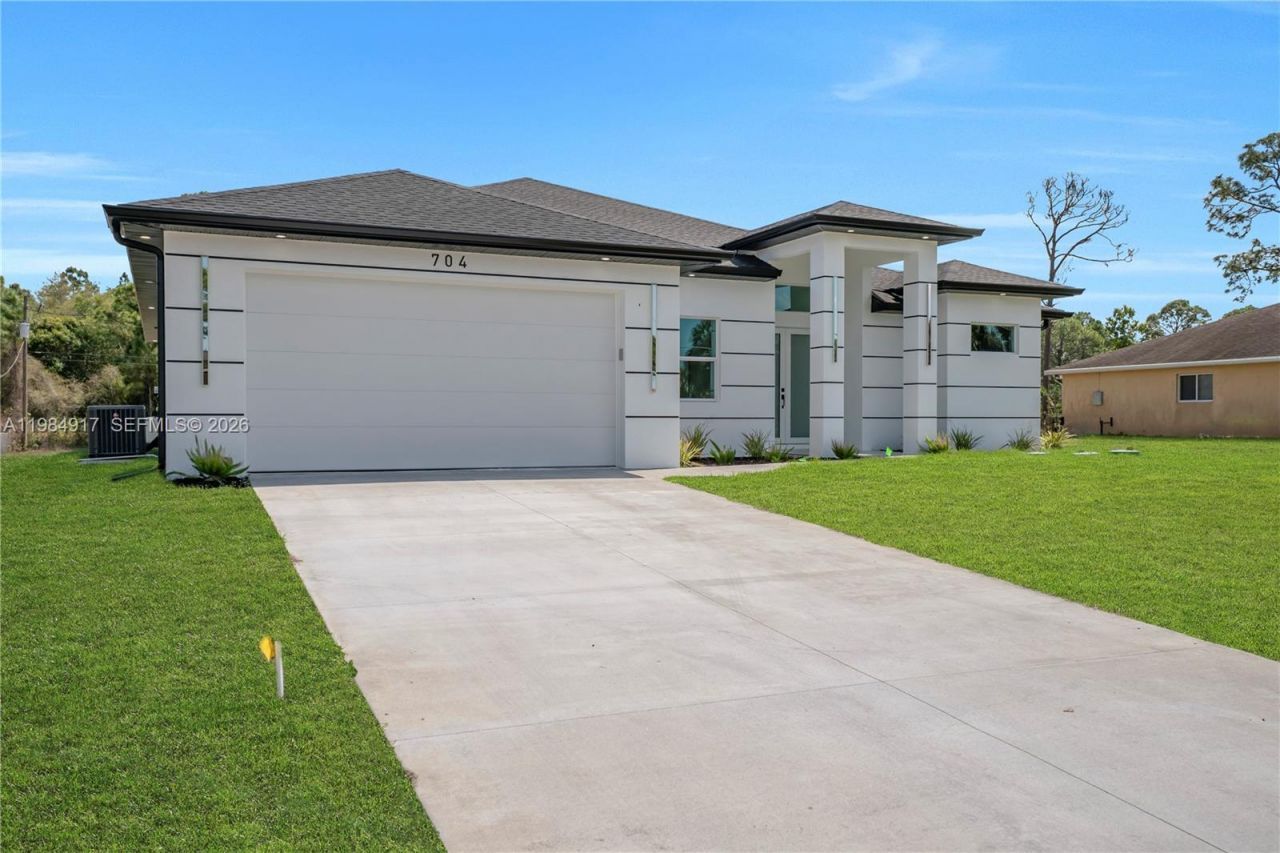 704 Clayton, Lehigh Acres, FL 33972 Photo