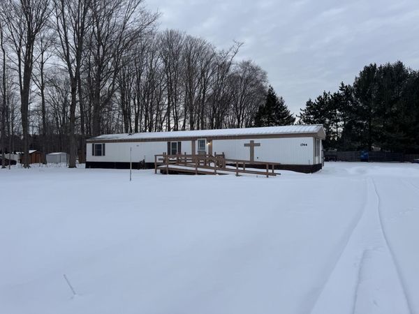 1744 Compton Court, Grawn, MI 49637