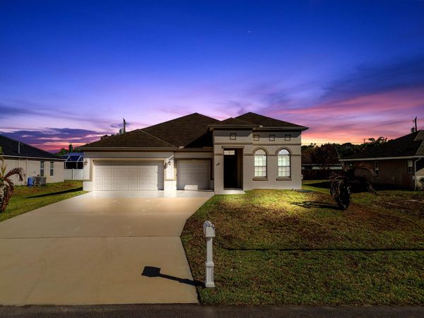 1957 SW Logan Street, Port St. Lucie, FL 34953