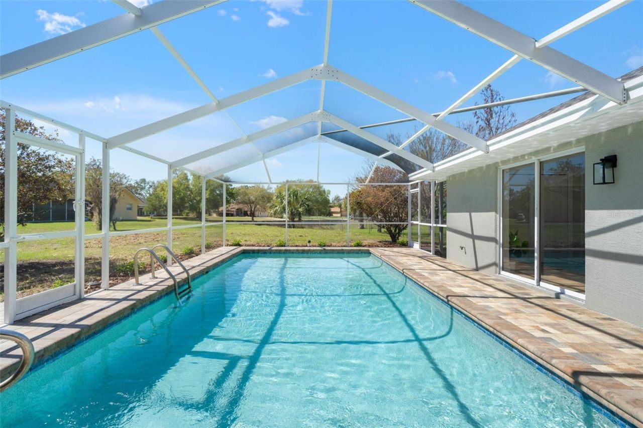 10185 Sleepy Willow Court, Spring Hill, FL 34608 Photo