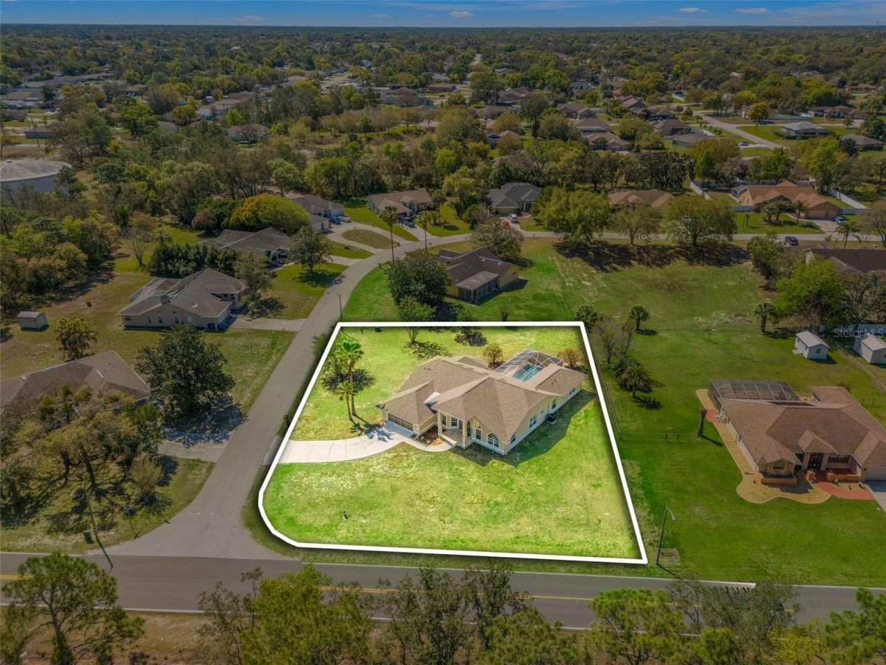 10185 Sleepy Willow Court, Spring Hill, FL 34608 Photo