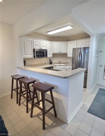 5 Bluebill Ave, Unit 305/405, Naples, FL 34108 Photo