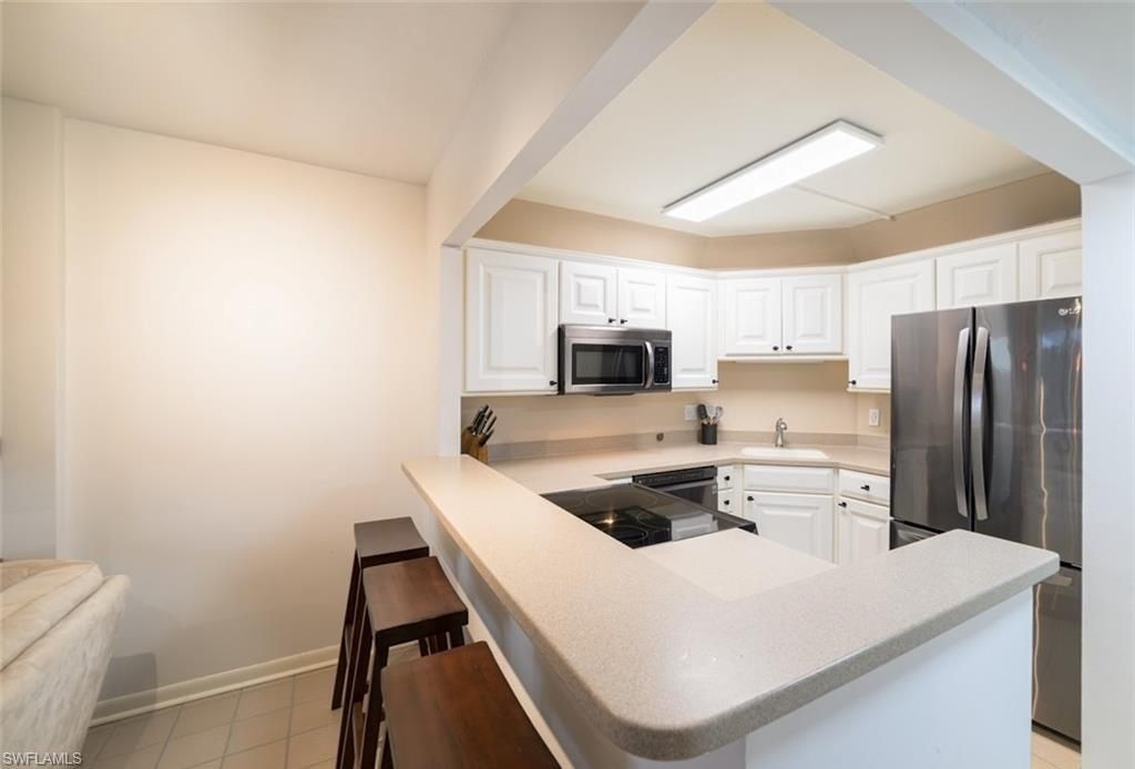 5 Bluebill Ave, Unit 305/405, Naples, FL 34108 Photo