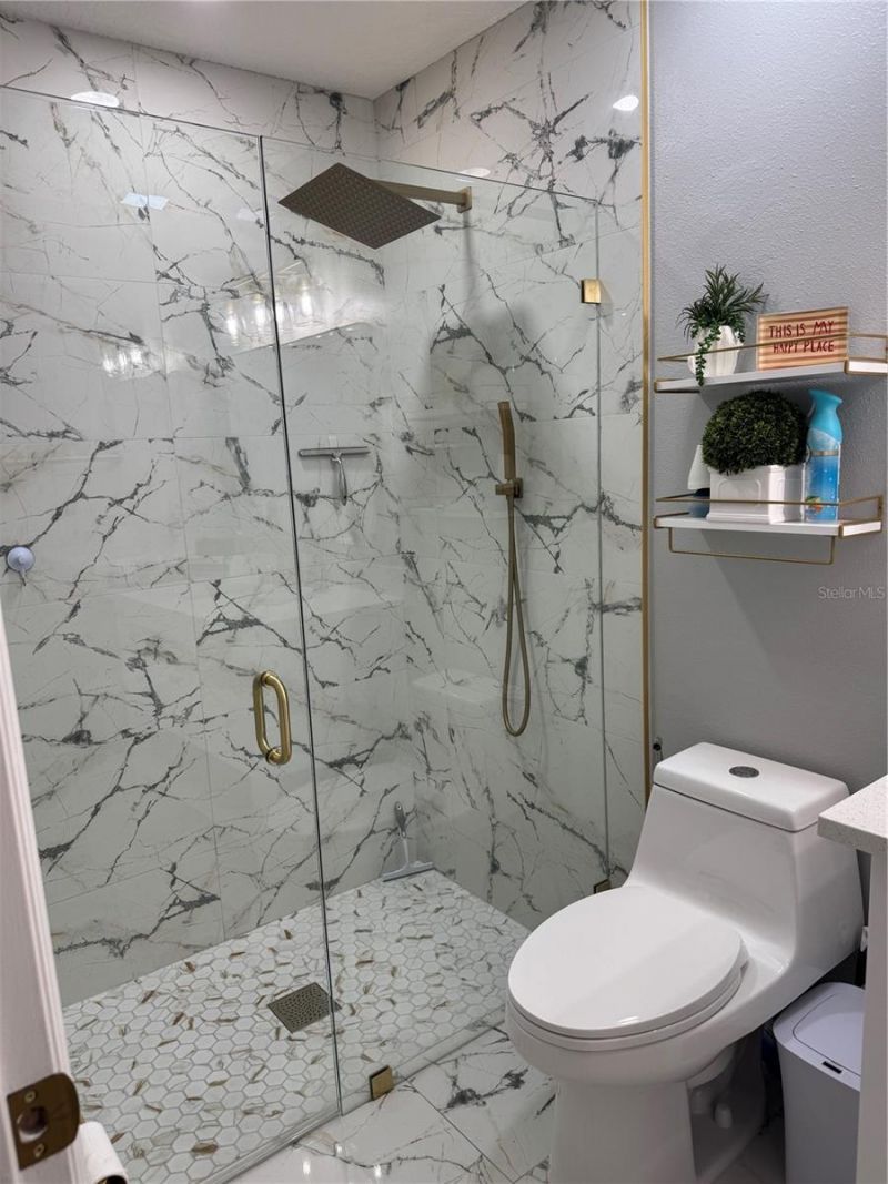 10407 N Woodmere Road , Tampa, FL 33617 Photo