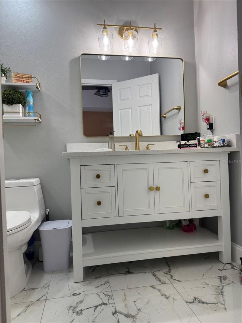 10407 N Woodmere Road , Tampa, FL 33617 Photo