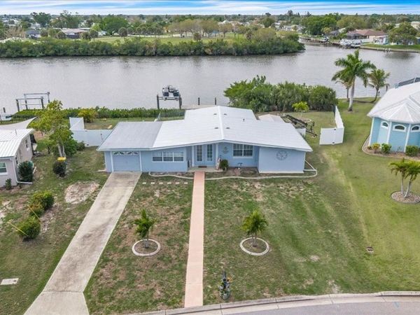 137 POINSETTIA CIRCLE NE, PORT CHARLOTTE, FL 33952