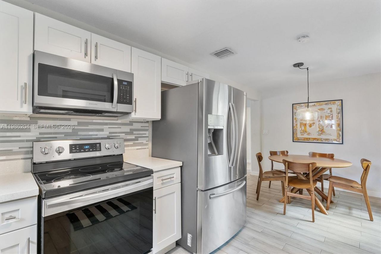 74 NW 117th St , Miami, FL 33168 Photo