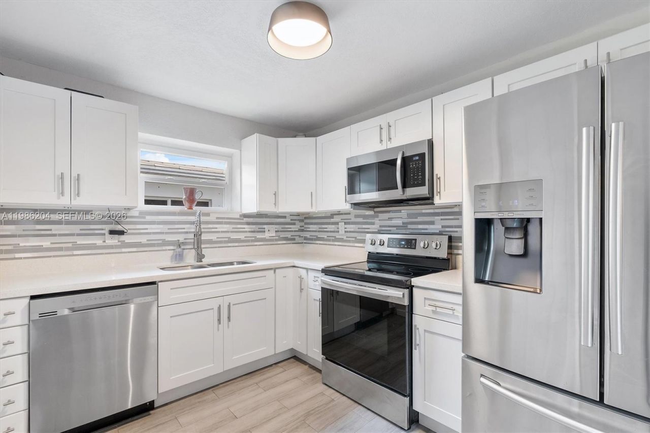 74 NW 117th St , Miami, FL 33168 Photo