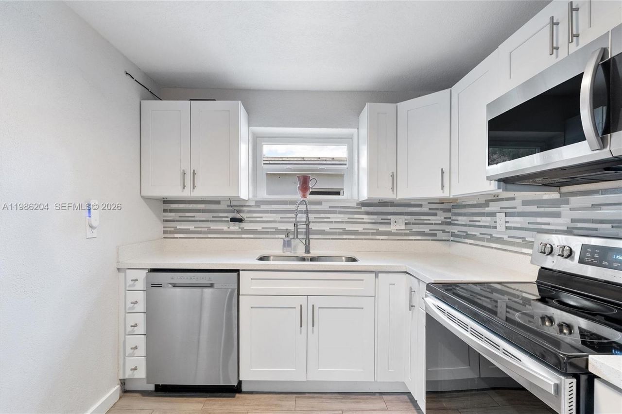 74 NW 117th St , Miami, FL 33168 Photo