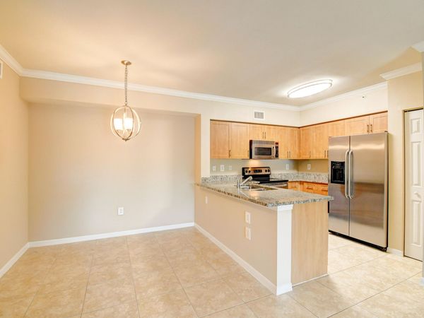 6505 Emerald Dunes Drive, Unit 201, West Palm Beach, FL 33411