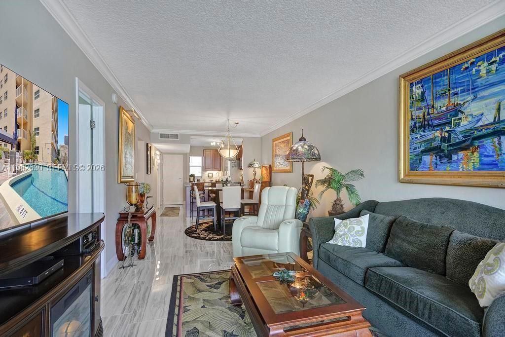 121 Golden Isles Dr , Unit 205, Hallandale Beach, FL 33009 Photo