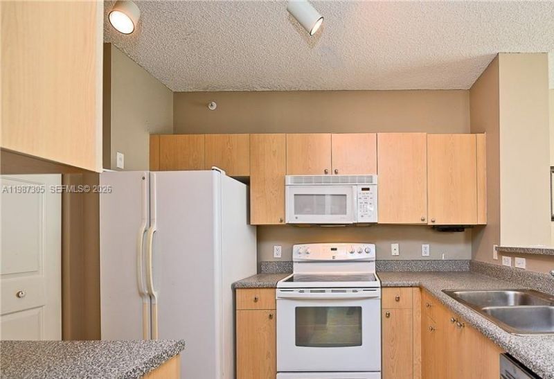 8000 N Nob Hill Rd, Unit 107, Tamarac, FL 33321 Photo