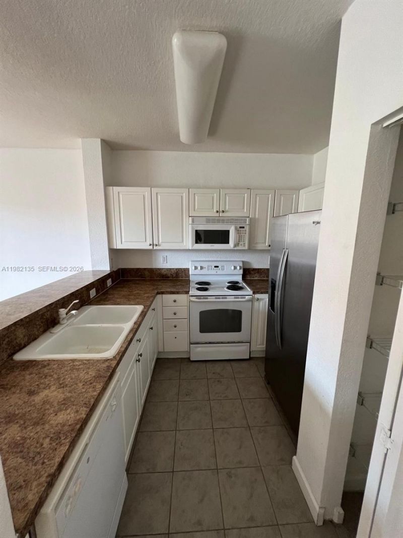 1420 NE 33rd Ave , Unit 201-15, Homestead, FL 33033 Photo