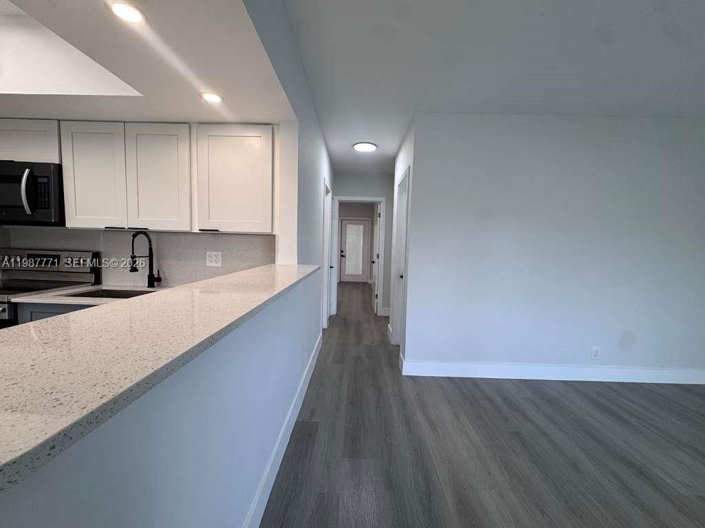 455 Golden Isles Dr , Unit 203, Hallandale Beach, FL 33009 Photo