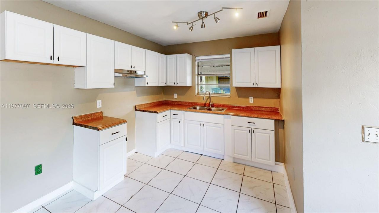 2760 NW 58th St , Miami, FL 33142 Photo