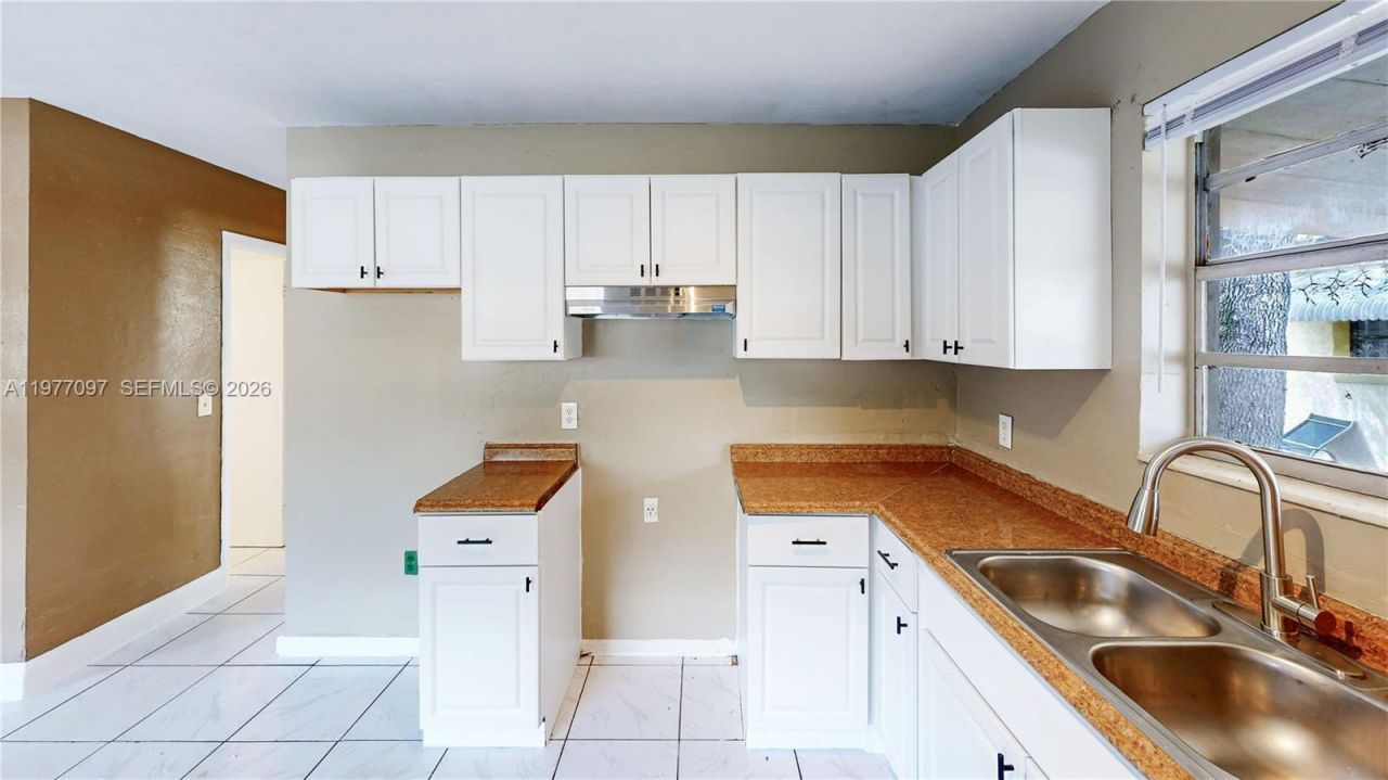 2760 NW 58th St , Miami, FL 33142 Photo