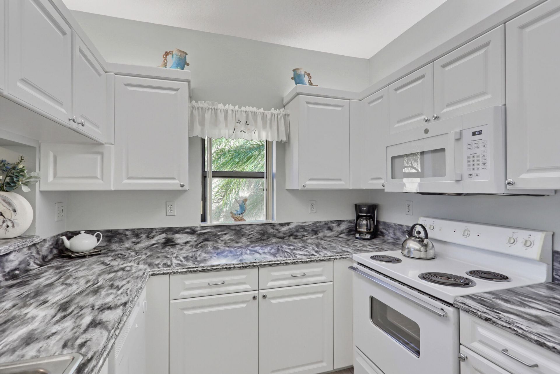 800 Uno Lago Drive, Unit 305, Juno Beach, FL 33408 Photo