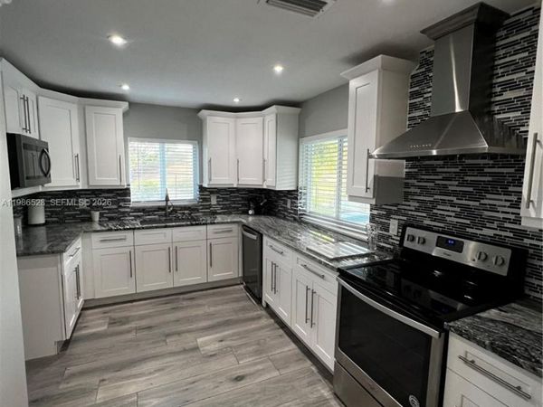 12002 NW 29th St , Coral Springs, FL 33065