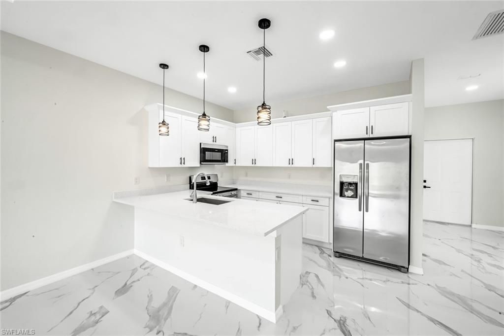 1235/1237 Hillcrest St E, Lehigh Acres, FL 33974 Photo