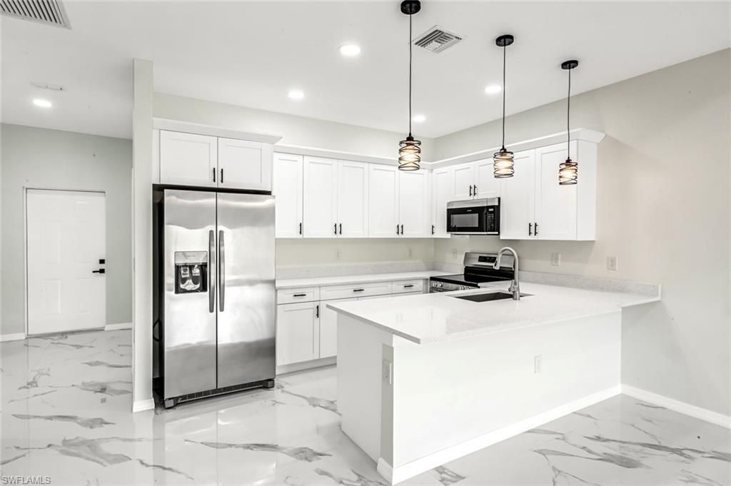 1235/1237 Hillcrest St E, Lehigh Acres, FL 33974 Photo