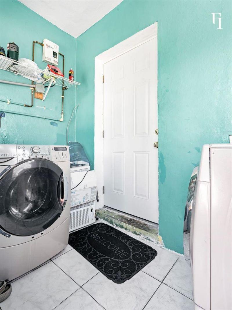 1195 NW 48th St , Miami, FL 33127 Photo