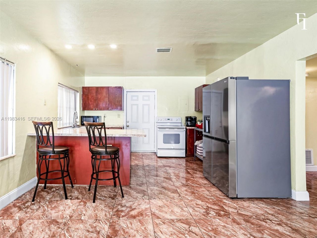 1195 NW 48th St , Miami, FL 33127 Photo