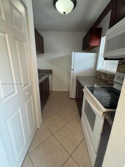 3212 NW 102nd Ter , Unit 203-F, Coral Springs, FL 33065 Photo