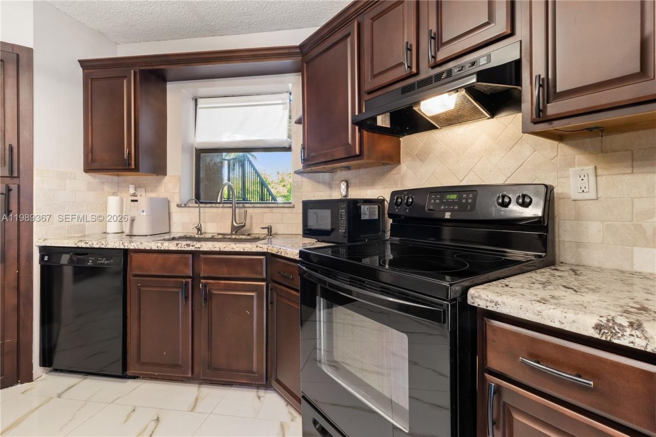 6855 W Broward Blvd , Unit 201, Plantation, FL 33317 Photo