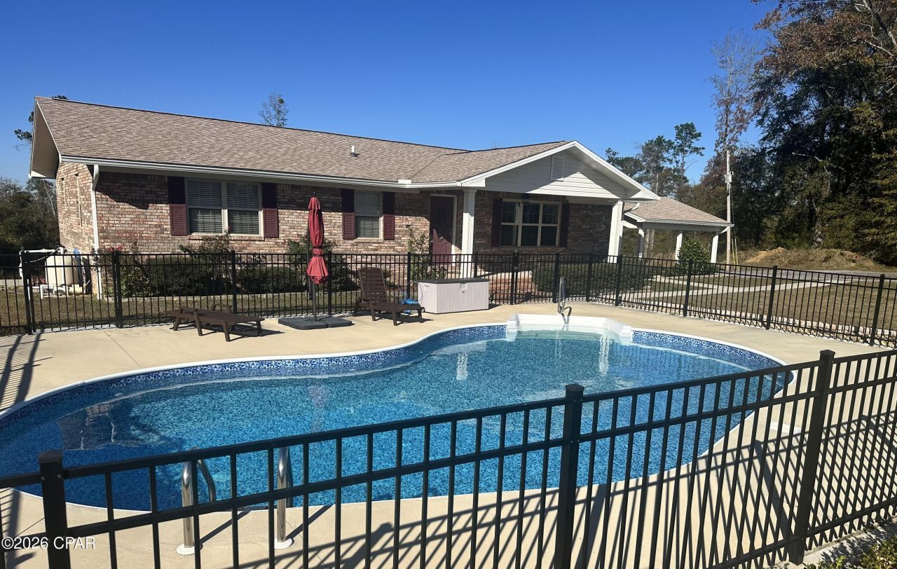 7426 Berry Drive, Grand Ridge, FL 32442 Main Photo