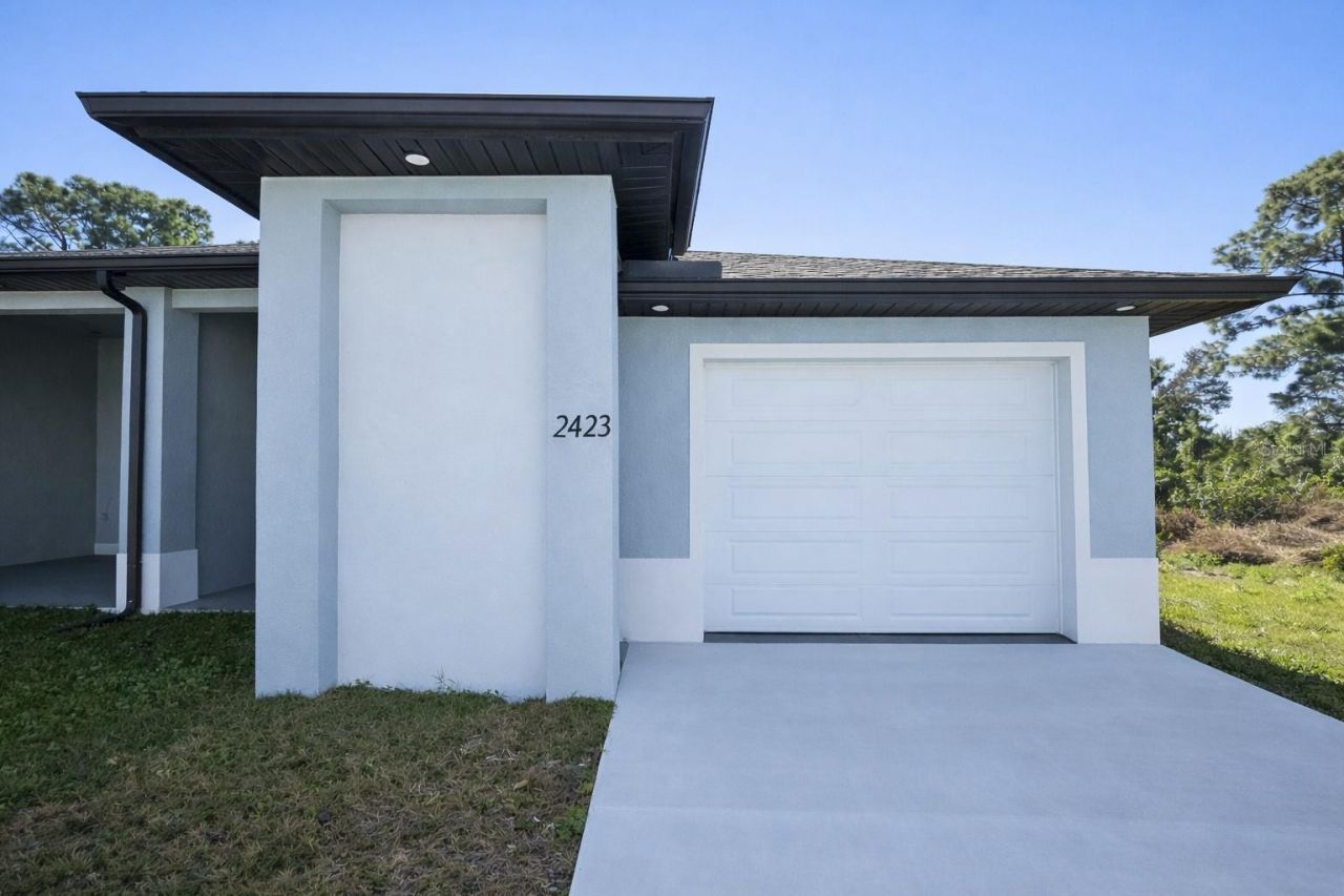 2423/2421 Milton Avenue S, Lehigh Acres, FL 33973 Photo