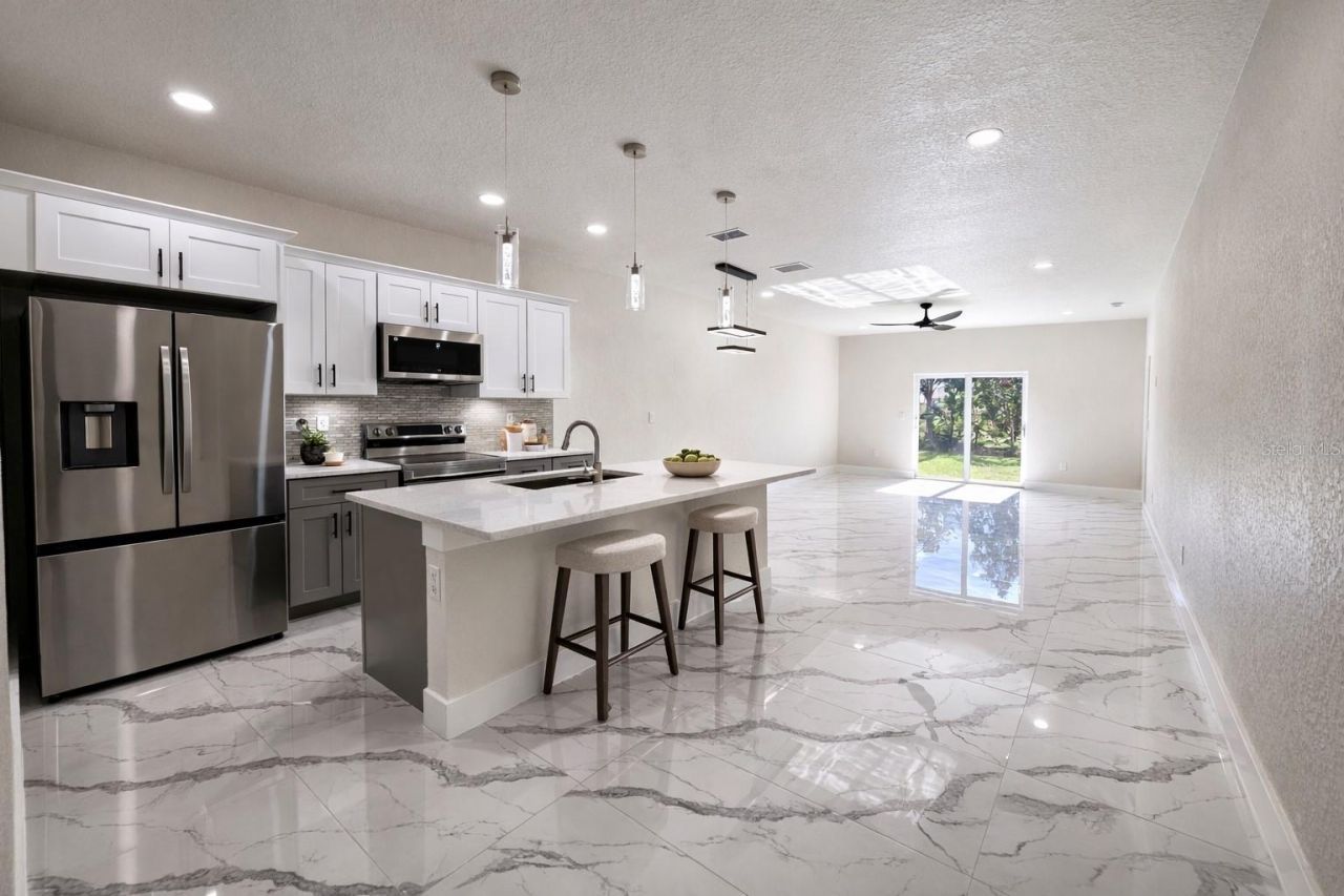 2423/2421 Milton Avenue S, Lehigh Acres, FL 33973 Photo