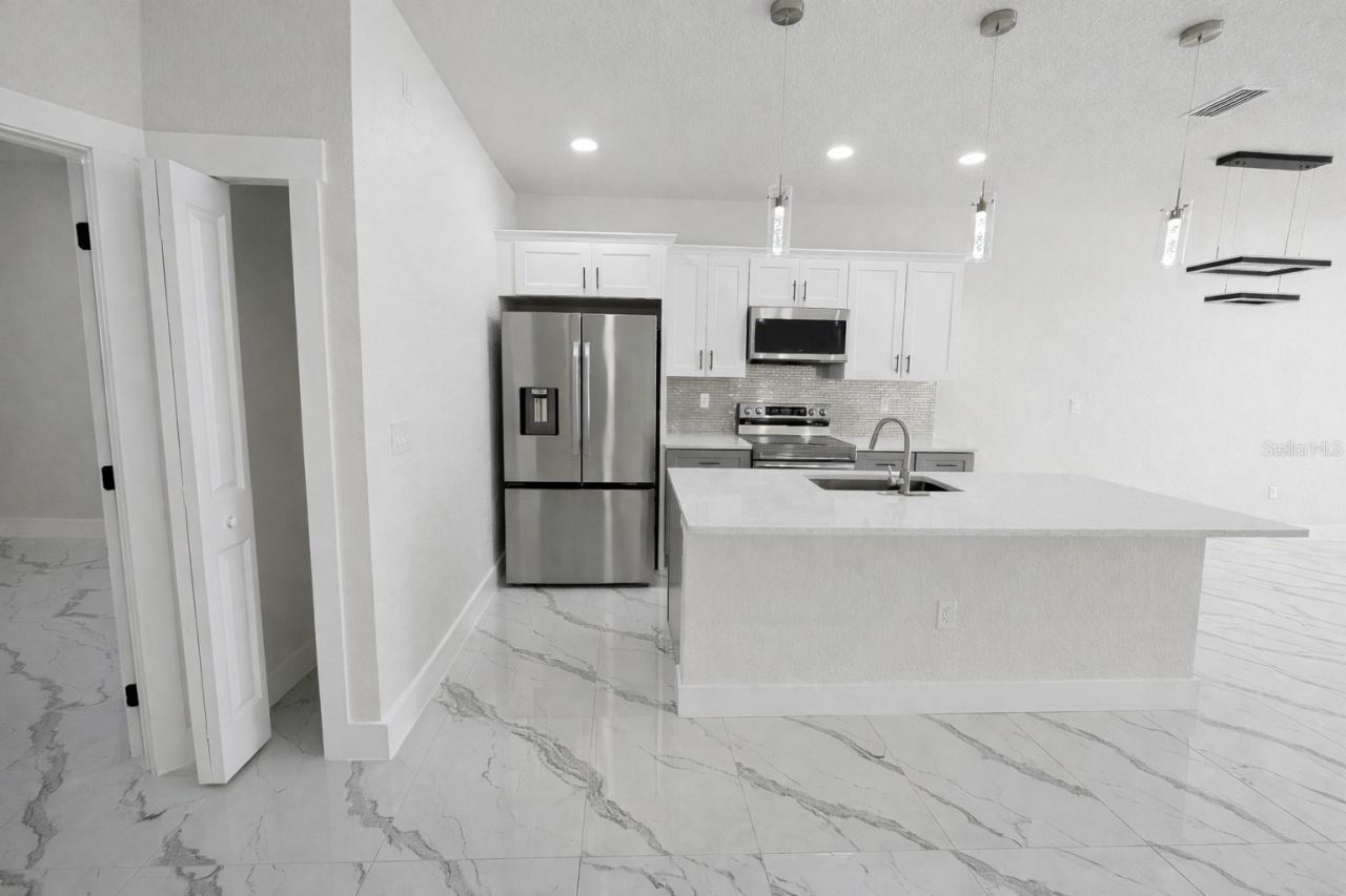 2423/2421 Milton Avenue S, Lehigh Acres, FL 33973 Photo