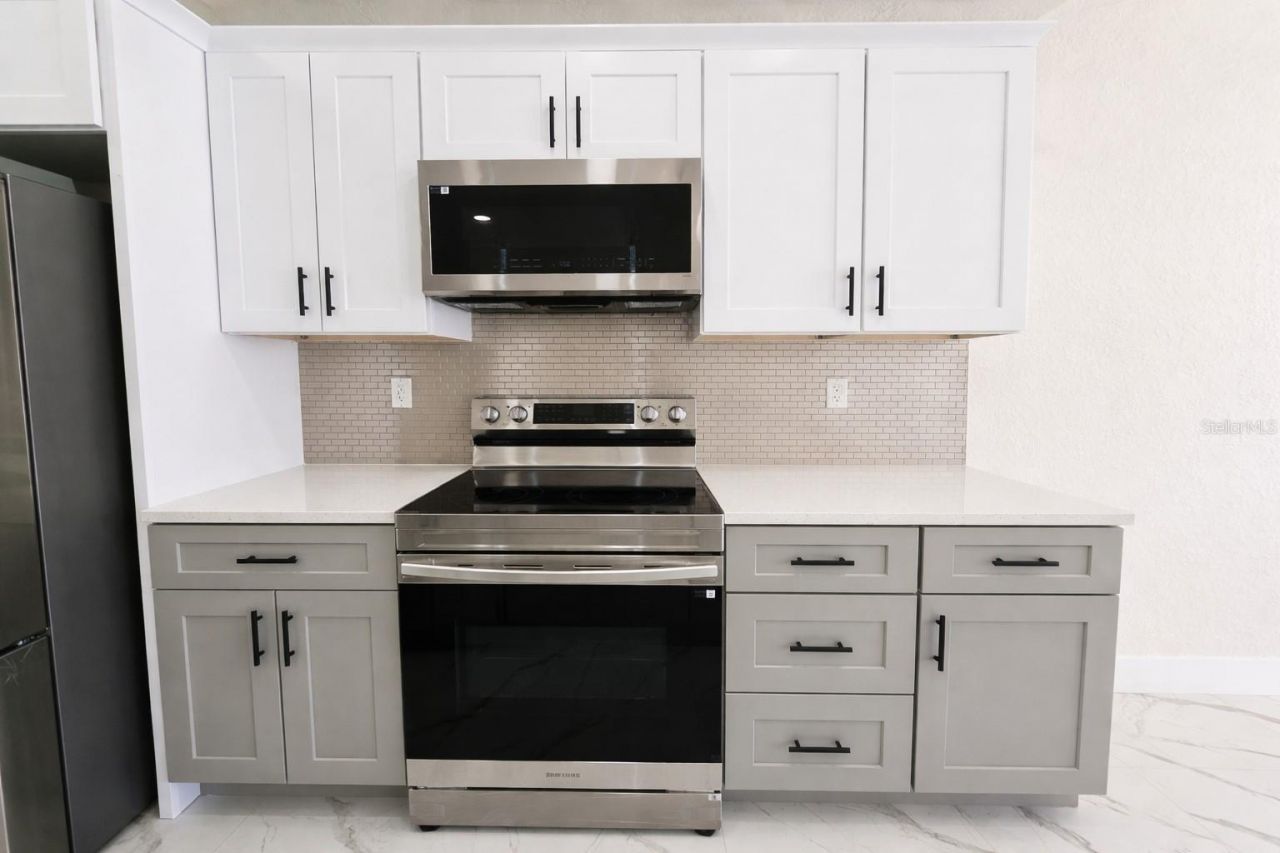 2423/2421 Milton Avenue S, Lehigh Acres, FL 33973 Photo