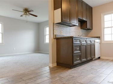 207 Neptune Drive, Walled Lake, MI 48390