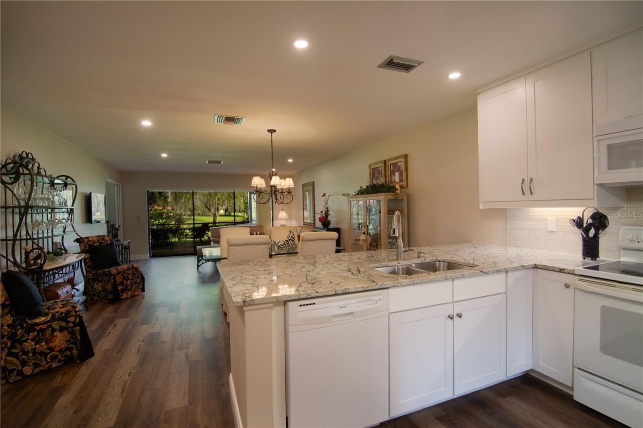 5635 Golf Pointe Drive , Unit 101, Sarasota, FL 34243 Photo