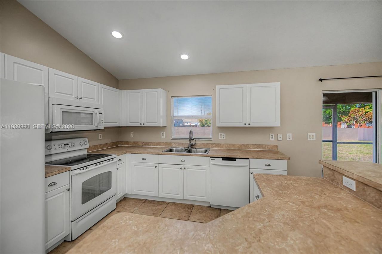 4104 SW 13th St. , Lehigh Acres, FL 33976 Photo