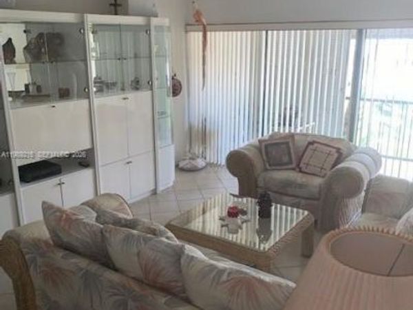 303 Racquet Club Rd , Unit 206, Weston, FL 33326