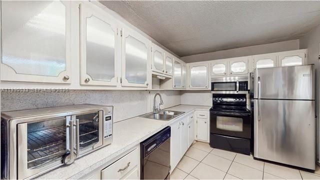 1401 NE 191st St , Unit D117, Miami, FL 33179 Photo