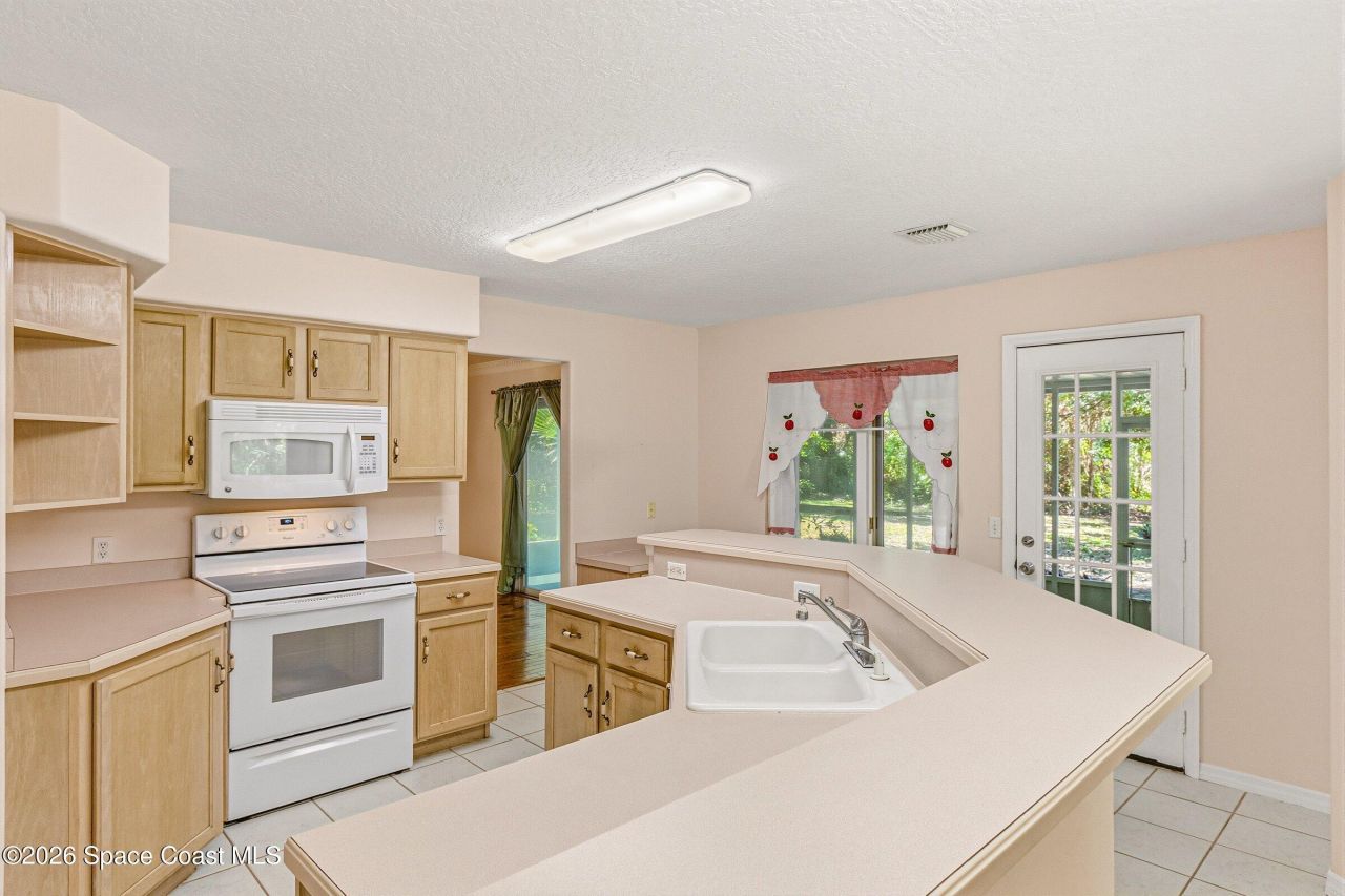 693 W Pine Road , Melbourne Village, FL 32904 Photo