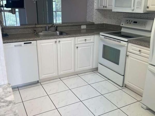 9592 Weldon Circle, Unit H407, Tamarac, FL 33321