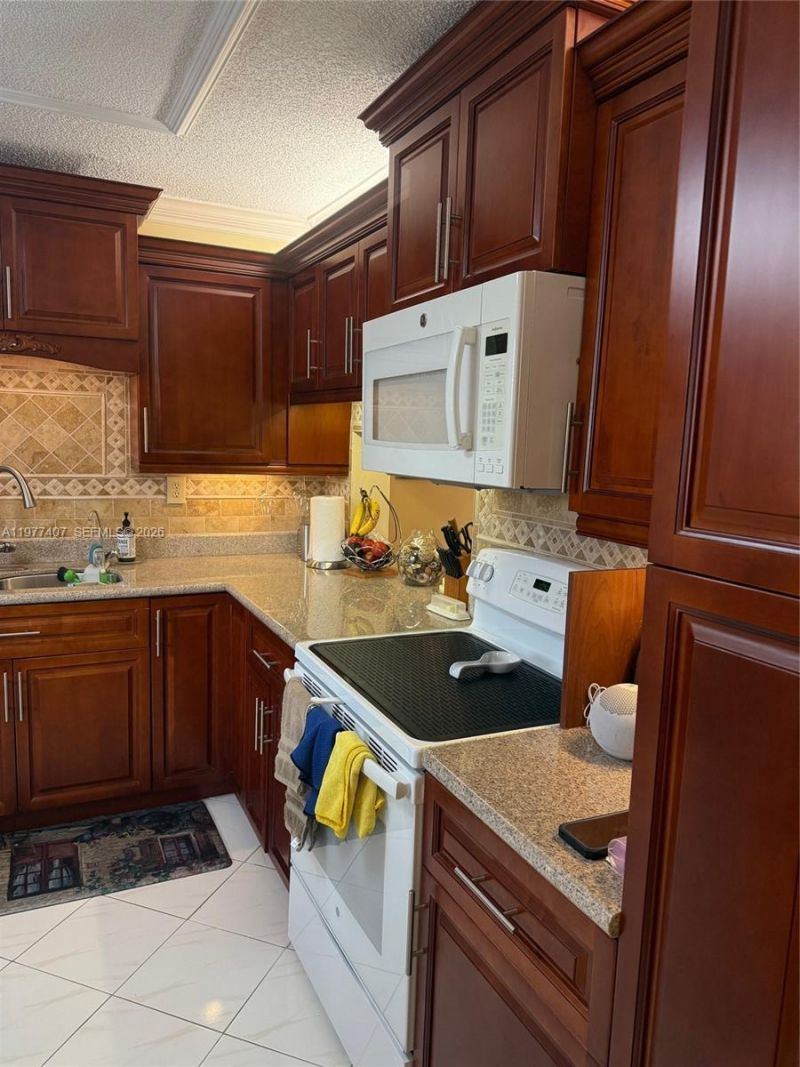 4940 E Sabal Palm Blvd , Unit 203, Tamarac, FL 33319 Photo