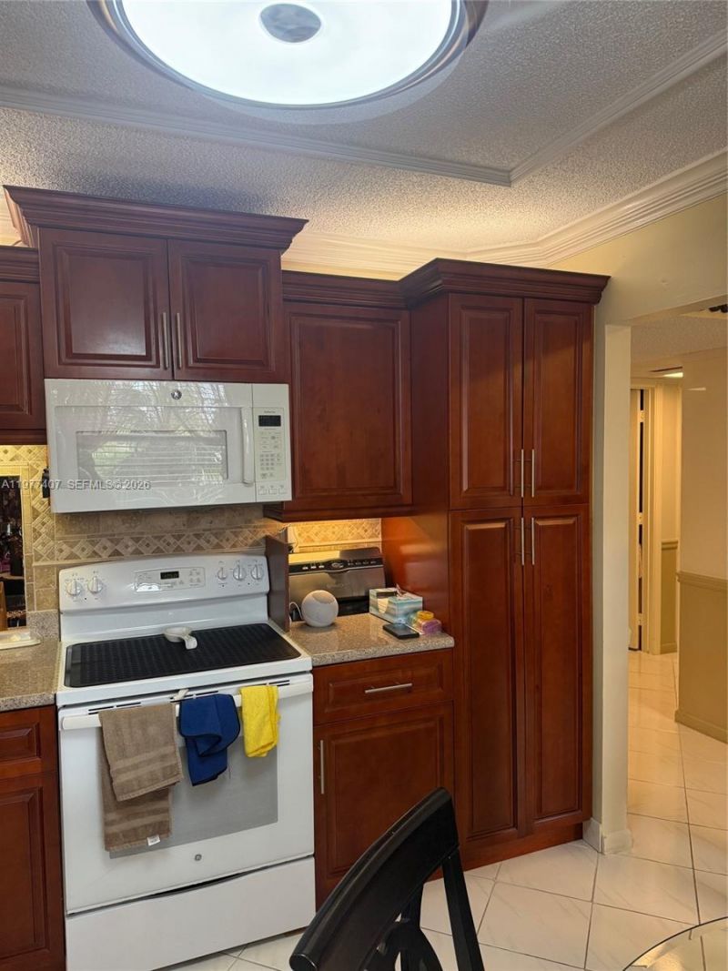 4940 E Sabal Palm Blvd , Unit 203, Tamarac, FL 33319 Photo