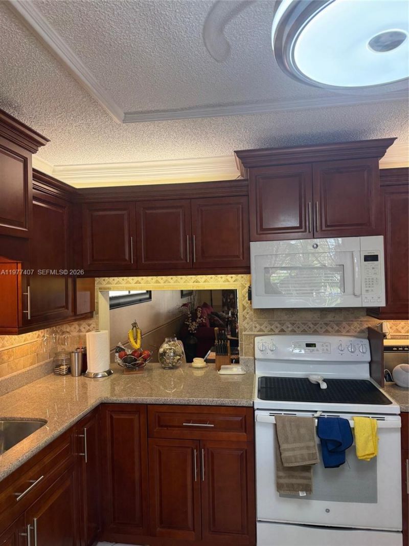 4940 E Sabal Palm Blvd , Unit 203, Tamarac, FL 33319 Photo