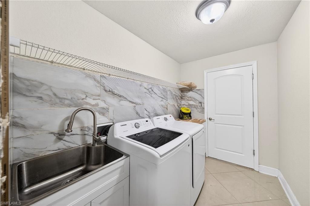 533 Willowbrook Dr , Lehigh Acres, FL 33972 Photo