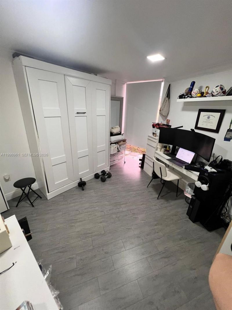 6955 NW 186th St , Unit F104, Hialeah, FL 33015 Photo