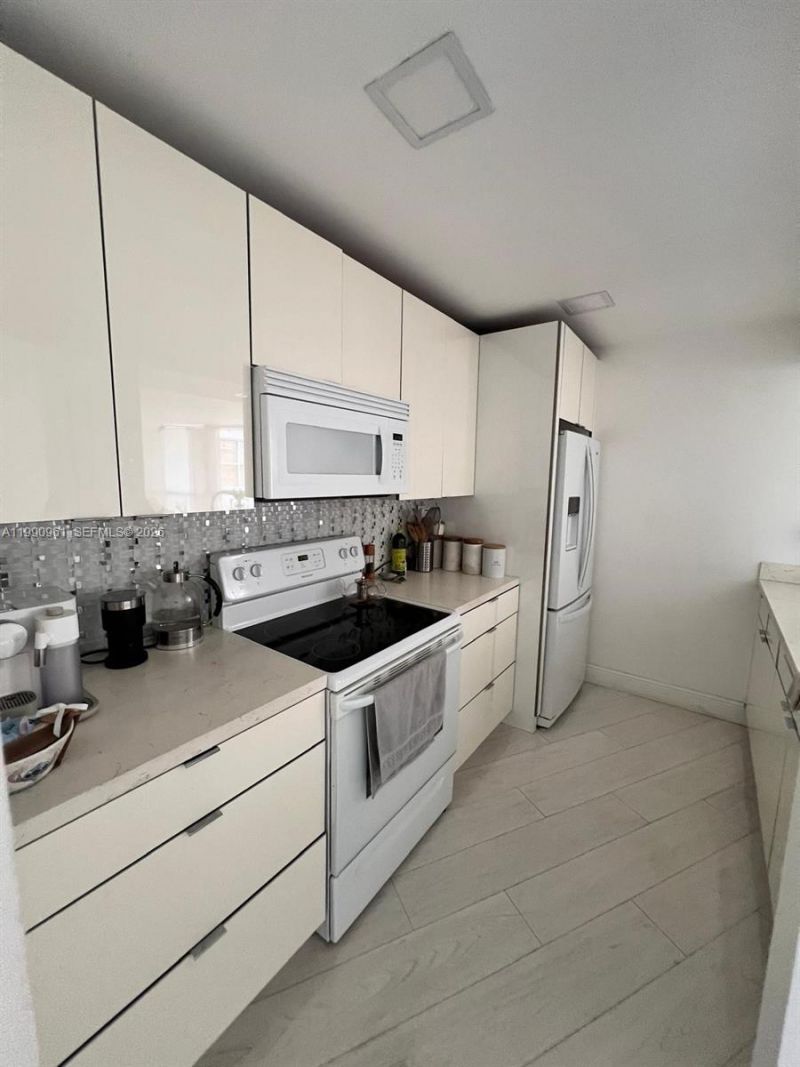 6955 NW 186th St , Unit F104, Hialeah, FL 33015 Photo