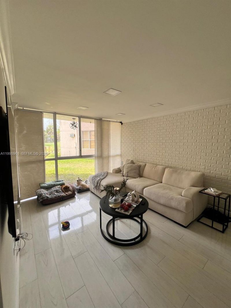 6955 NW 186th St , Unit F104, Hialeah, FL 33015 Photo