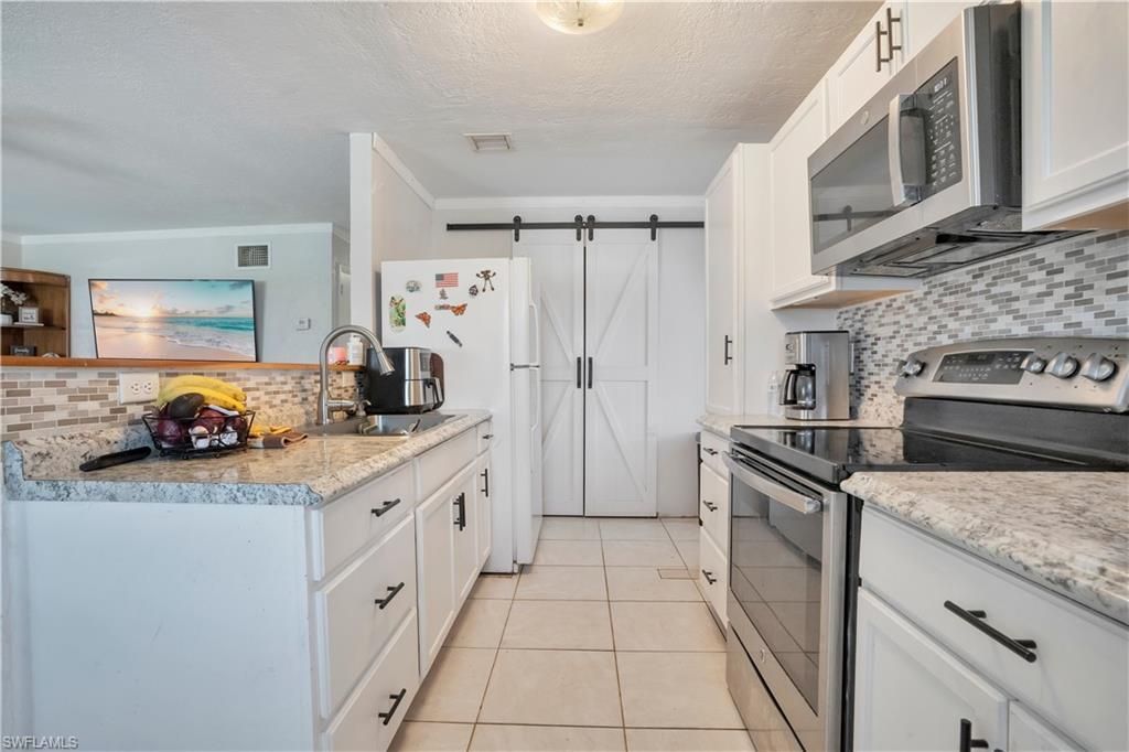 1102 Kanza Ct, Lehigh Acres, FL 33936 Photo